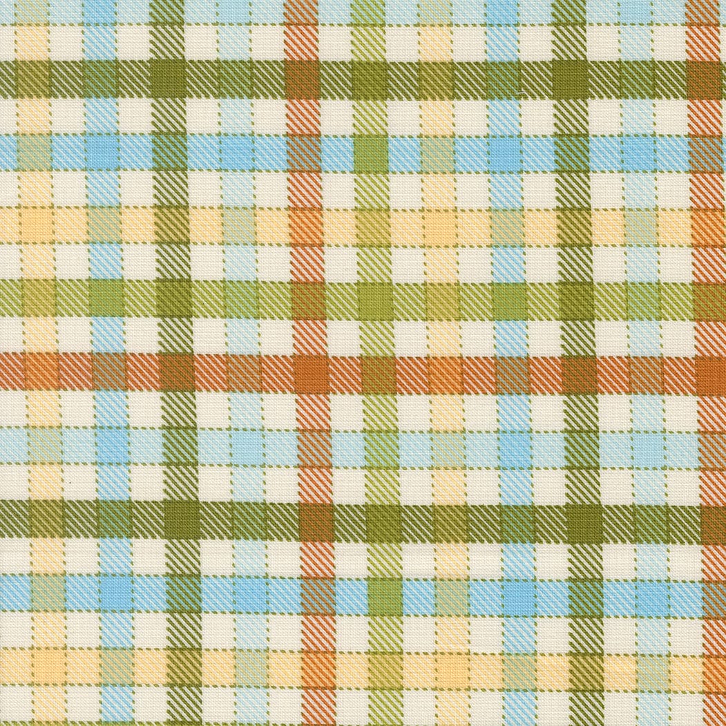 A closeup shot of the quilting fabric pattern called Baby Check, designed by Stacy Iest Hsu, in the iguana colorway. The SKU is 20966 16.
