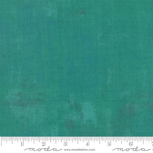 Cotton quilting fabric pattern called 'Grunge in Jade'. Part of the 'Grunge Basics' fabric collection. Designed by Basic Grey for fabric company Moda Fabrics. SKU: 30150 305. 44-45 inch width.