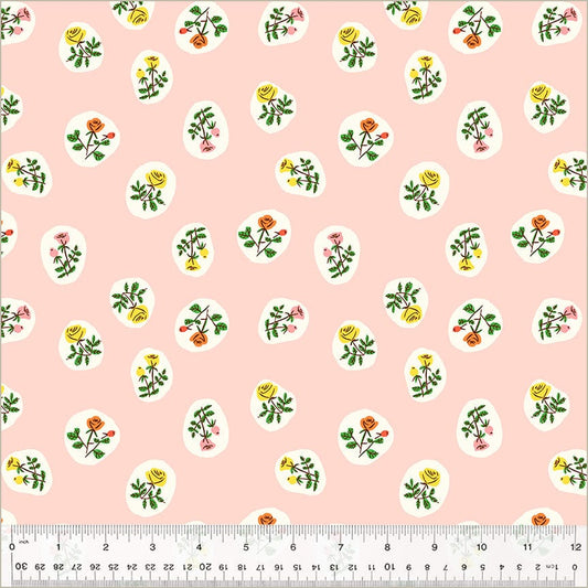 A closeup shot of the quilting fabric pattern called Bouquet, designed by Heather Ross, in the blush colorway. The SKU is 40930D-4.