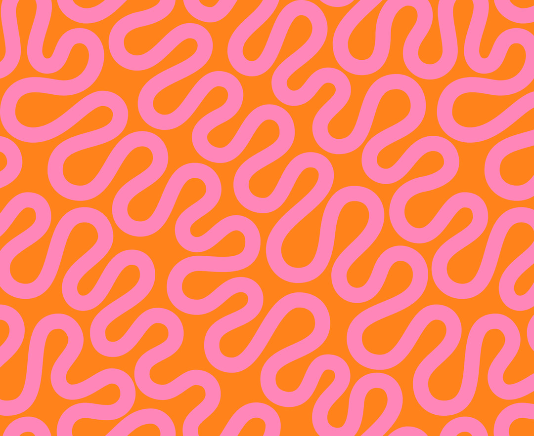 A closeup shot of the quilting fabric pattern called Unspooled, designed by Emily Van Hoff, in the orange zest colorway. The SKU is 42372 15.