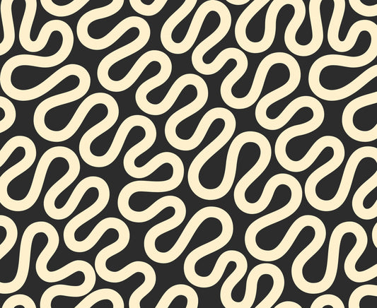 A closeup shot of the quilting fabric pattern called Unspooled, designed by Emily Van Hoff, in the tuxedo colorway. The SKU is 42372 27.