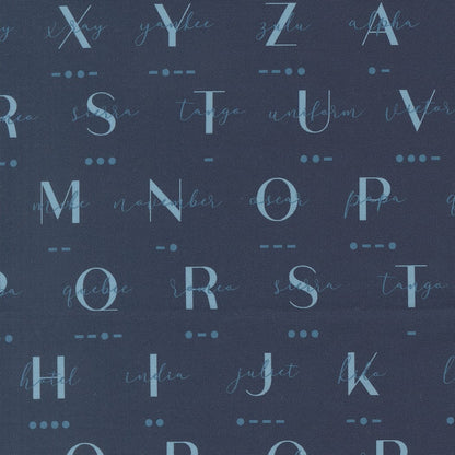 A closeup shot of the quilting fabric pattern called Phonetic Morse, designed by Sariditty, in the navy colorway. The SKU is 45062 18.