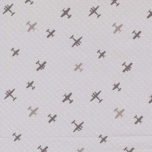 A closeup shot of the quilting fabric pattern called Flight Path, designed by Sariditty, in the smoke colorway. The SKU is 45064 21.