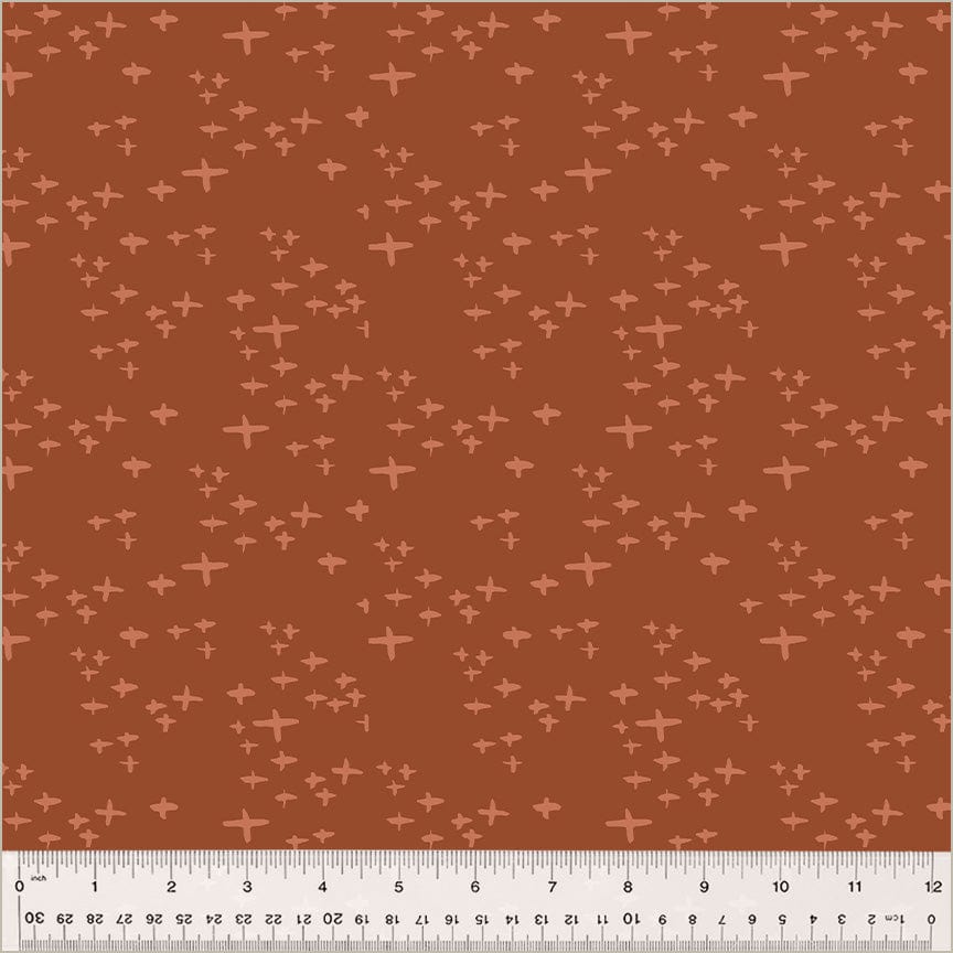 Cotton quilting fabric pattern called 'Glimmer in Brick'. Part of the 'Moonlit' fabric collection. Designed by Jennifer Moore / Monaluna for fabric company Windham Fabrics. SKU: 54289-4. 44-45 inch width.