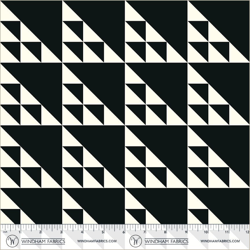 A closeup shot of the quilting fabric pattern called Birds in the Air, designed by Whistler Studios, in the black colorway. The SKU is 54880-3.