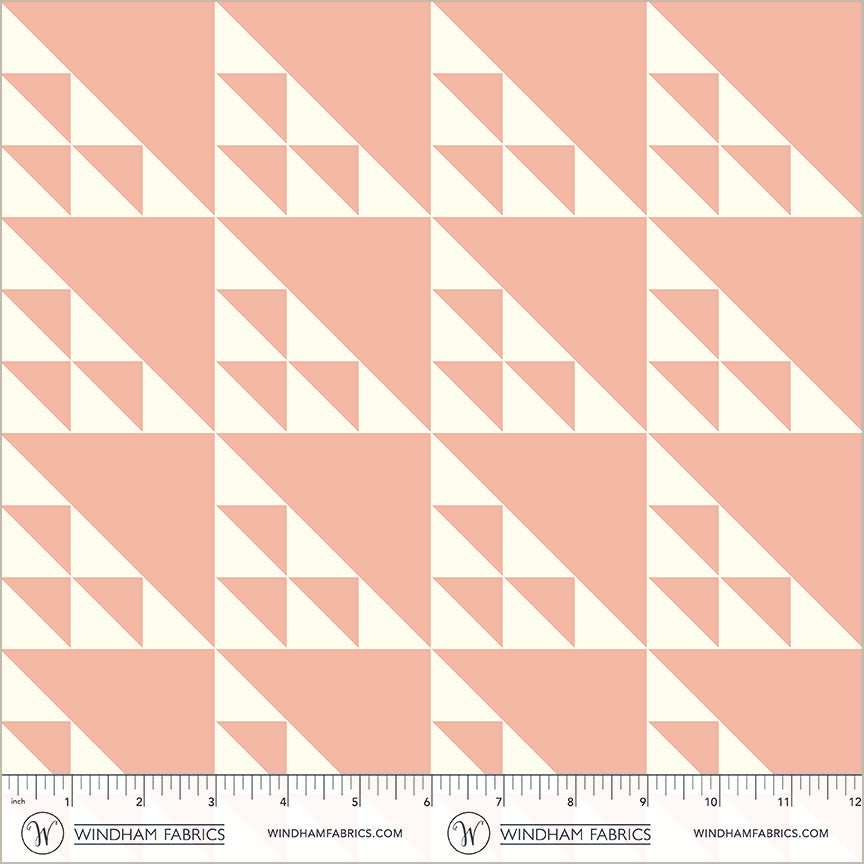 A closeup shot of the quilting fabric pattern called Birds in the Air, designed by Whistler Studios, in the pink colorway. The SKU is 54880-4.