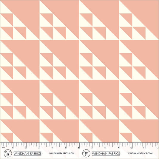 A closeup shot of the quilting fabric pattern called Birds in the Air, designed by Whistler Studios, in the pink colorway. The SKU is 54880-4.