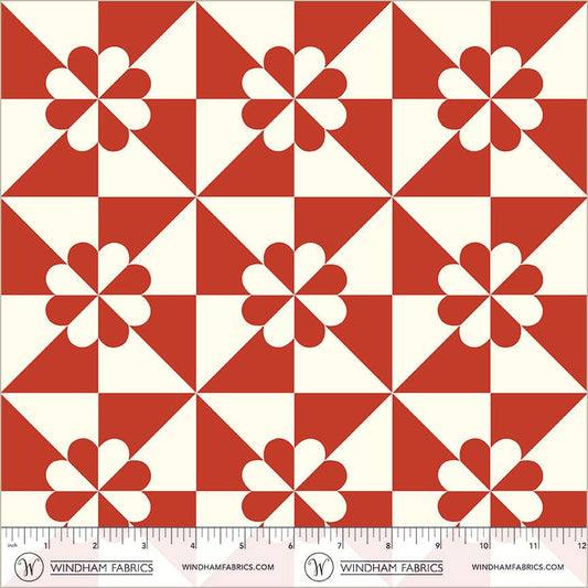 A closeup shot of the quilting fabric pattern called Hearts and Gizzards, designed by Whistler Studios, in the red colorway. The SKU is 54881-1.