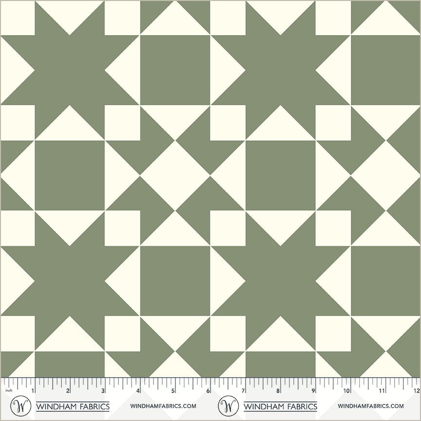 A closeup shot of the quilting fabric pattern called Sawtooth, designed by Whistler Studios, in the jade colorway. The SKU is 54883-7.