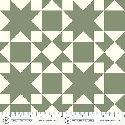 A closeup shot of the quilting fabric pattern called Sawtooth, designed by Whistler Studios, in the jade colorway. The SKU is 54883-7.