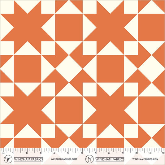 A closeup shot of the quilting fabric pattern called Sawtooth, designed by Whistler Studios, in the orange colorway. The SKU is 54883-8.