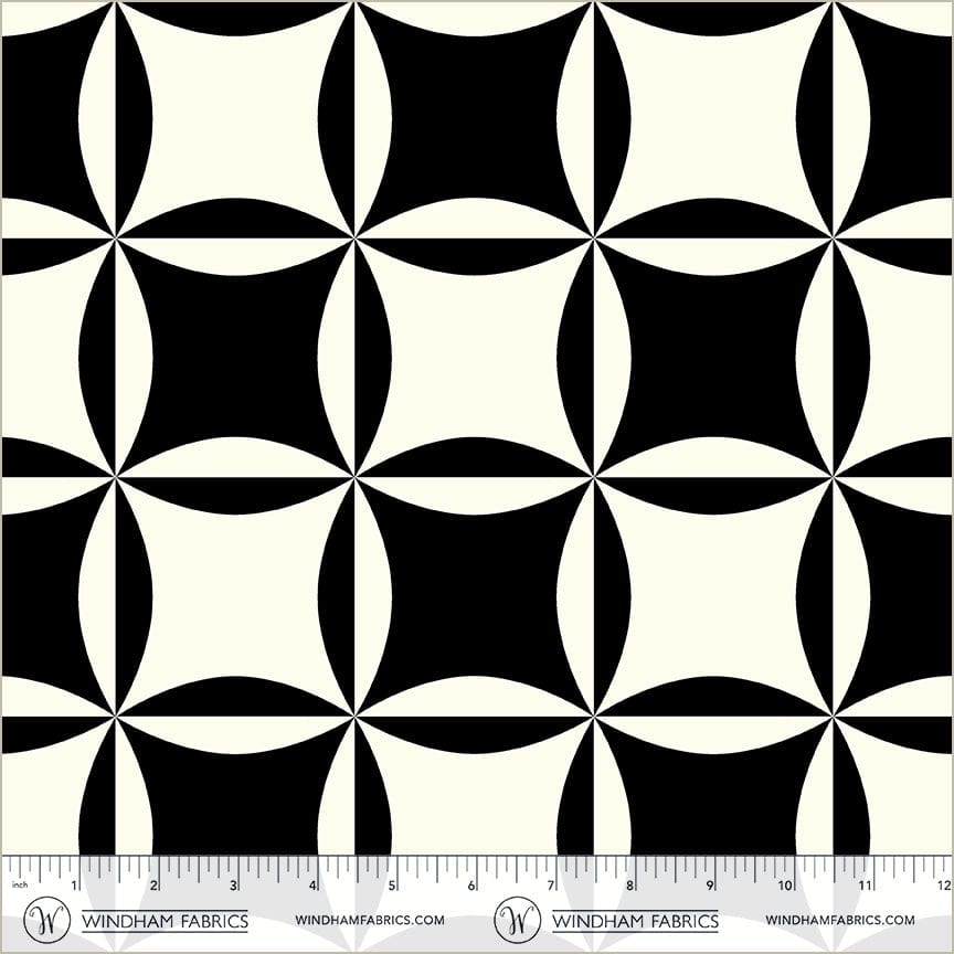 A closeup shot of the quilting fabric pattern called Cathedral Window, designed by Whistler Studios, in the black colorway. The SKU is 54885C-3.