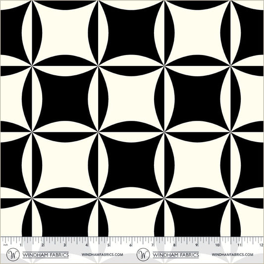 A closeup shot of the quilting fabric pattern called Cathedral Window, designed by Whistler Studios, in the black colorway. The SKU is 54885C-3.