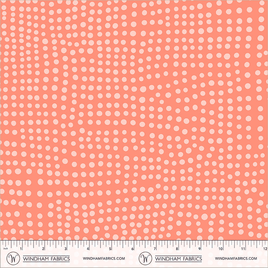 Dot in Coral quilting fabric, part of the Electric Rainbow fabric collection by Deborah Fisher (SKU: 55659-16)