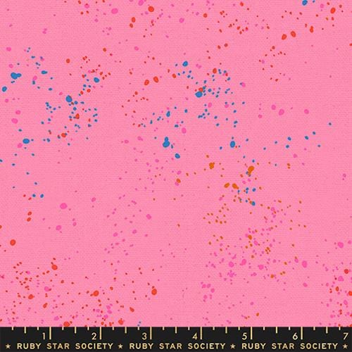 A closeup shot of the canvas fabric pattern called Speckled, designed by Rashida Coleman Hale, in the Flamingo colorway. The SKU isRS11177 123L