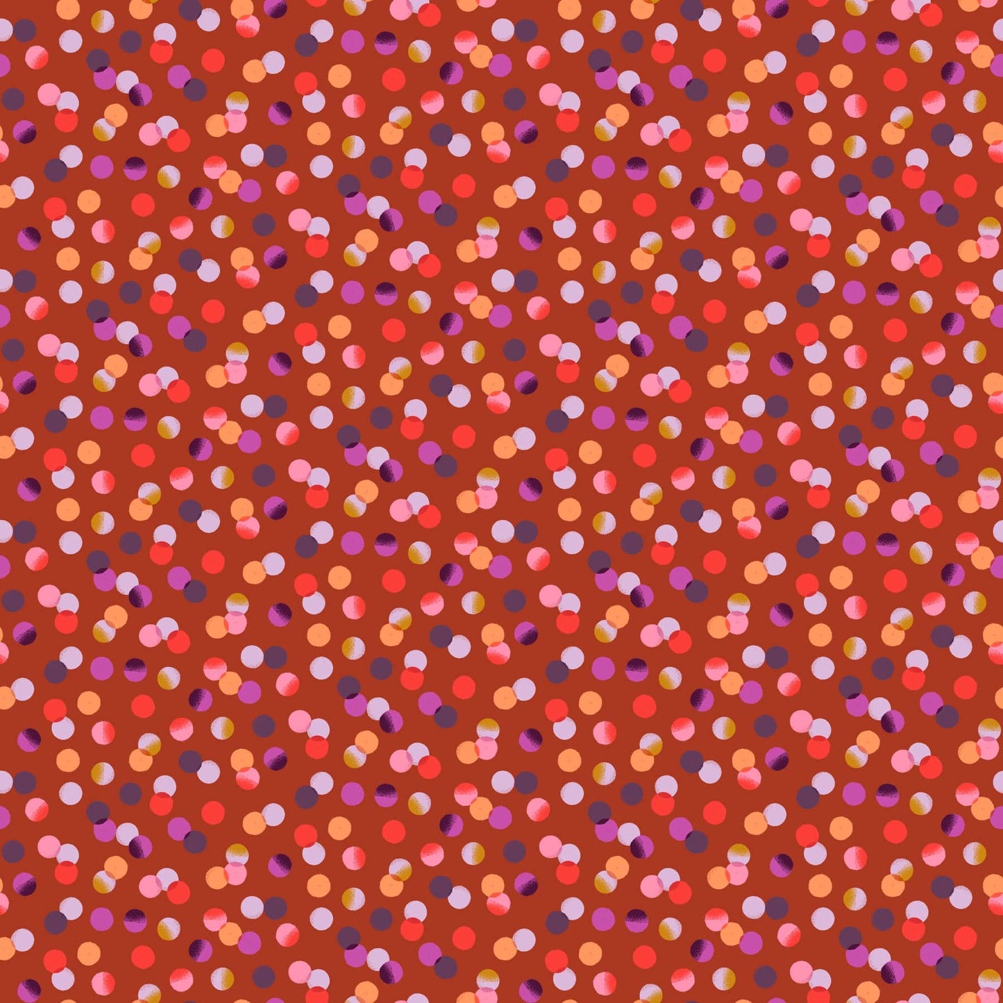 A closeup shot of the quilting fabric pattern called Dots, designed by Josephine Kimberling, in the rust colorway. The SKU is 91061-36.