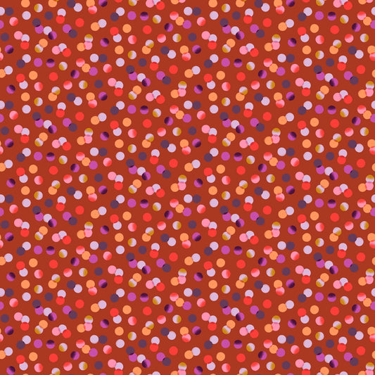 A closeup shot of the quilting fabric pattern called Dots, designed by Josephine Kimberling, in the rust colorway. The SKU is 91061-36.