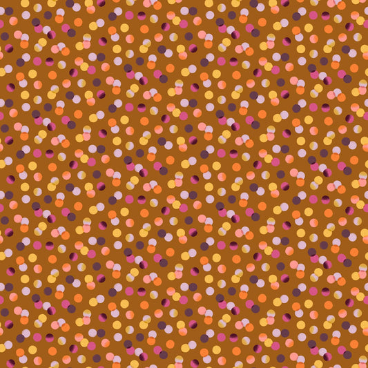 A closeup shot of the quilting fabric pattern called Dots, designed by Josephine Kimberling, in the ochre colorway. The SKU is 91061-50.