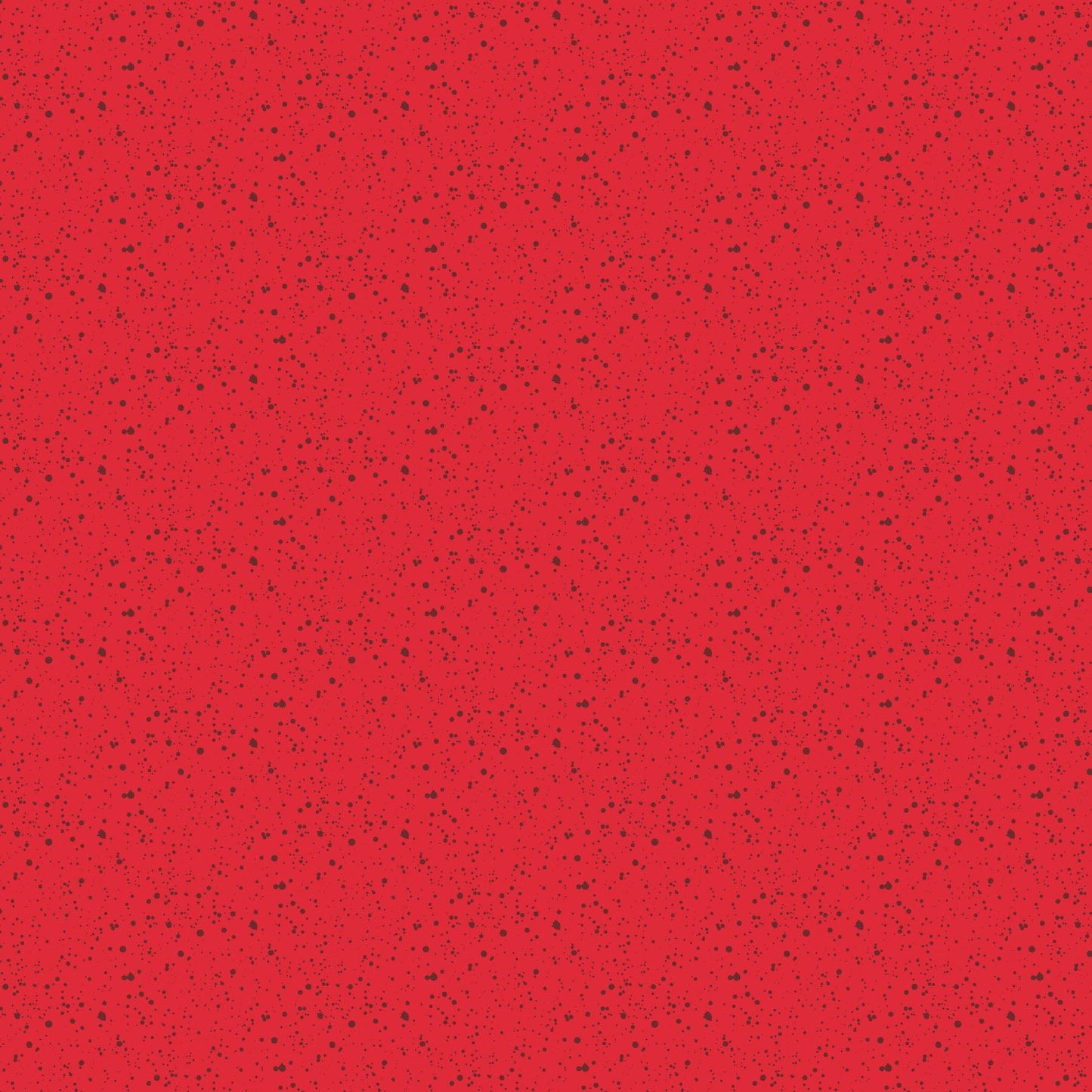 A closeup shot of the quilting fabric pattern called Splatter, designed by Josephine Kimberling, in the red colorway. The SKU is 91063-24.