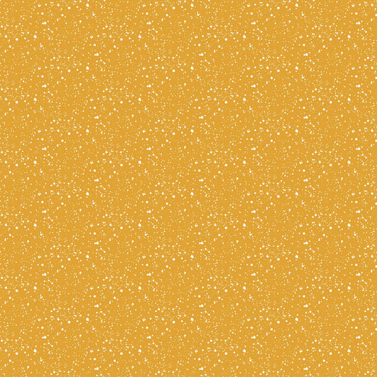 A closeup shot of the quilting fabric pattern called Splatter, designed by Josephine Kimberling, the ochre colorway. The SKU is 91063-50.