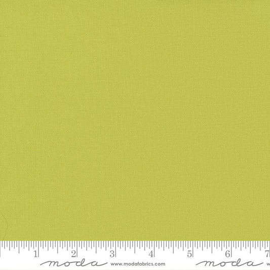 Cotton quilting fabric pattern called 'Chartreuse'. Part of the 'Bella Solids' fabric collection. Designed by Moda Fabrics for fabric company Moda Fabrics. SKU: 9900 188. 44-45 inch width.
