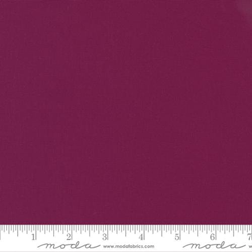 Cotton quilting fabric pattern called 'Boysenberry'. Part of the 'Bella Solids' fabric collection. Designed by Moda Fabrics for fabric company Moda Fabrics. SKU: 9900 217. 44-45 inch width.