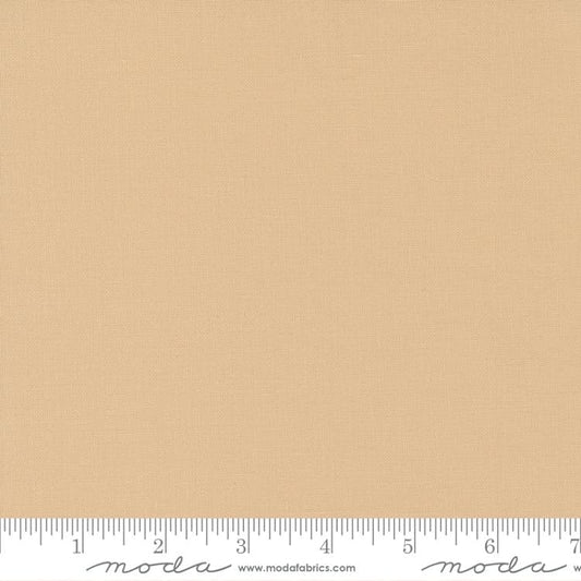 Cotton quilting fabric pattern called 'Almond'. Part of the 'Bella Solids' fabric collection. Designed by Moda Fabrics for fabric company Moda Fabrics. SKU: 9900 243. 44-45 inch width.