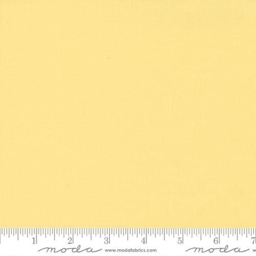 Cotton quilting fabric pattern called 'Canary'. Part of the 'Bella Solids' fabric collection. Designed by Moda Fabrics for fabric company Moda Fabrics. SKU: 9900 272. 44-45 inch width.