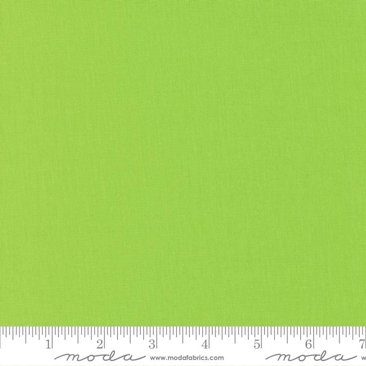 Cotton quilting fabric pattern called 'Wasabi'. Part of the 'Bella Solids' fabric collection. Designed by Moda Fabrics for fabric company Moda Fabrics. SKU: 9900 392. 44-45 inch width.