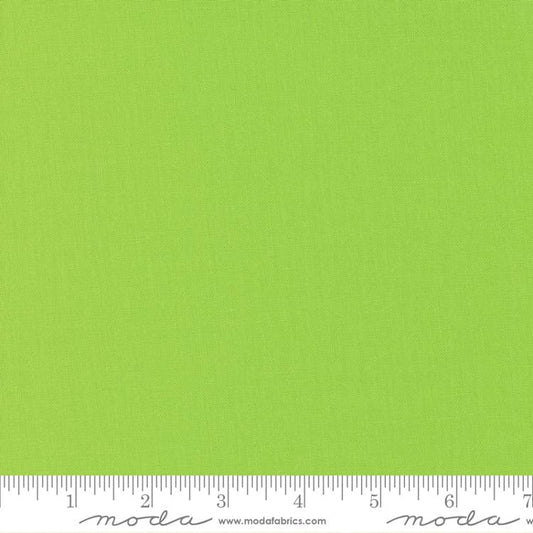 Cotton quilting fabric pattern called 'Wasabi'. Part of the 'Bella Solids' fabric collection. Designed by Moda Fabrics for fabric company Moda Fabrics. SKU: 9900 392. 44-45 inch width.