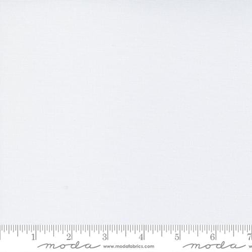 Cotton quilting fabric pattern called 'Super White'. Part of the 'Bella Solids' fabric collection. Designed by Moda for fabric company Moda. SKU: 9900 436. 44-45 inch width.