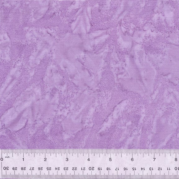 A closeup shot of the quilting fabric pattern called BeColourful Blush, designed by Jacqueline de Jonge, in the lovely lilac colorway. The SKU is BCB12Q-X.