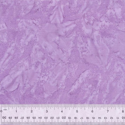 A closeup shot of the quilting fabric pattern called BeColourful Blush, designed by Jacqueline de Jonge, in the lovely lilac colorway. The SKU is BCB12Q-X.