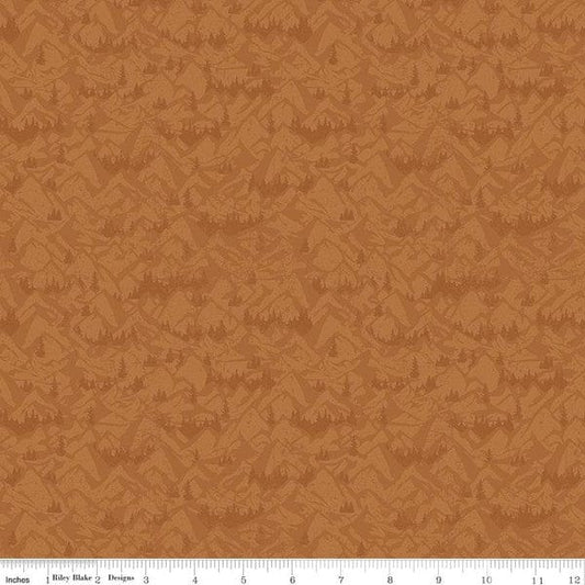 Cotton quilting fabric pattern called 'Mountains in Sienna'. Part of the 'Legends of the National Parks' fabric collection. Designed by Anderson Design Group for fabric company Riley Blake. SKU: C13284-SIENNA. 44-45 inch width.