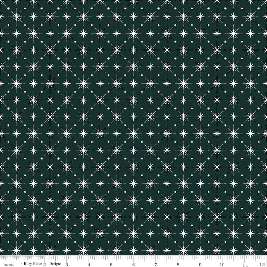Cotton quilting fabric pattern called 'Stars in Forest'. Part of the 'Christmas is in Town' fabric collection. Designed by Sandy Gervais for fabric company Riley Blake. SKU: C14747-FOREST. 44-45 inch width.