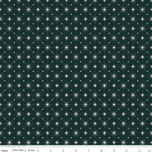 Cotton quilting fabric pattern called 'Stars in Forest'. Part of the 'Christmas is in Town' fabric collection. Designed by Sandy Gervais for fabric company Riley Blake. SKU: C14747-FOREST. 44-45 inch width.