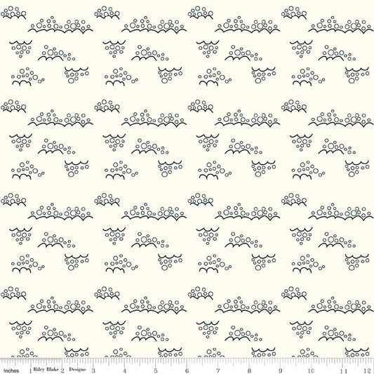 Cotton quilting fabric pattern called 'Snowballs in Cream'. Part of the 'Christmas is in Town' fabric collection. Designed by Sandy Gervais for fabric company Riley Blake. SKU: C14749-CREAM. 44-45 inch width.