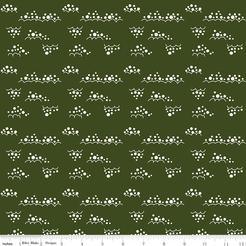 Cotton quilting fabric pattern called 'Snowballs in Dark Green'. Part of the 'Christmas is in Town' fabric collection. Designed by Sandy Gervais for fabric company Riley Blake. SKU: C14749-DKGREEN. 44-45 inch width.