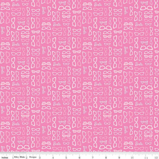 Cotton quilting fabric pattern called 'Barbie Glasses Medium Pink'. Part of the 'Barbie World' fabric collection. Designed by Riley Blake Designs for fabric company Riley Blake. SKU: C15025-MEDPINK. 44-45 inch width.