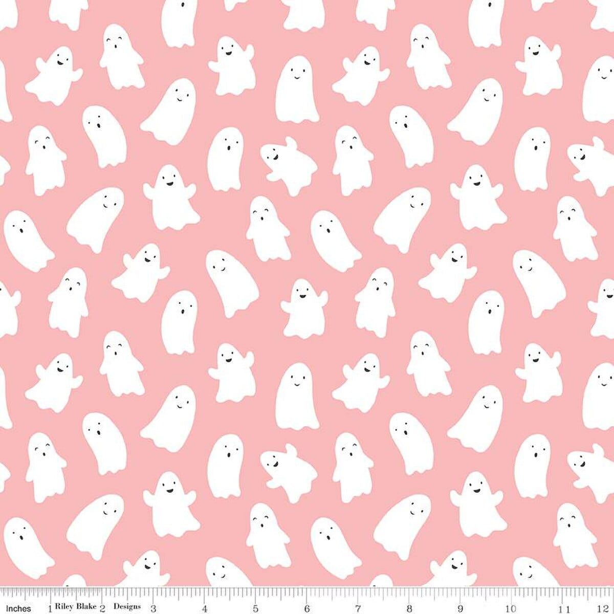 A closeup shot of the quilting fabric pattern called Ghosts, designed by My Mind's Eye for Riley Blake, in the pink colorway. The SKU is C16032-PINK.