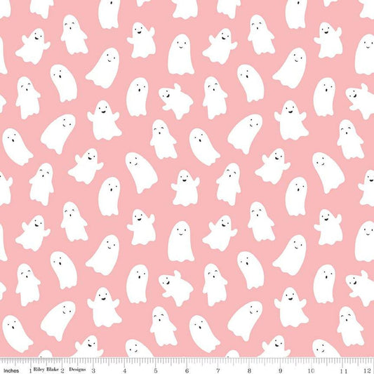 A closeup shot of the quilting fabric pattern called Ghosts, designed by My Mind's Eye for Riley Blake, in the pink colorway. The SKU is C16032-PINK.
