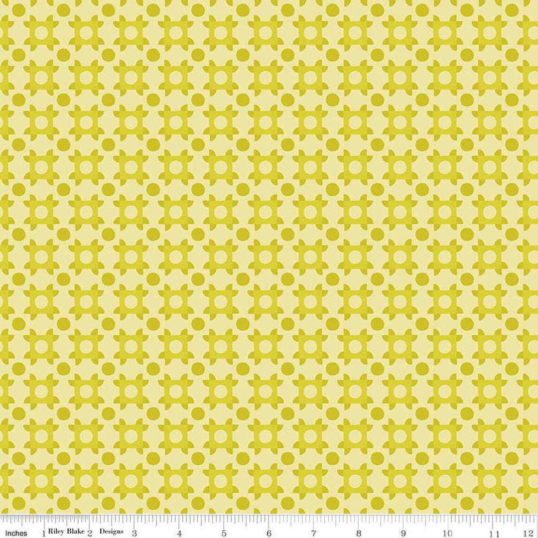 A closeup shot of the quilting fabric pattern called Patchwork Piazza, designed by Genesis Hall, in the citrine colorway. The SKU is C16933-CITRINE.