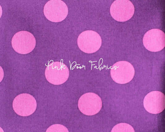 Cotton quilting fabric pattern called 'Pom Poms in Foxglove'. Part of the 'True Colors' fabric collection. Designed by Tula Pink for fabric company Free Spirit Fabrics. SKU: PWTP118.FOXGLOVE. 44-45 inch width.