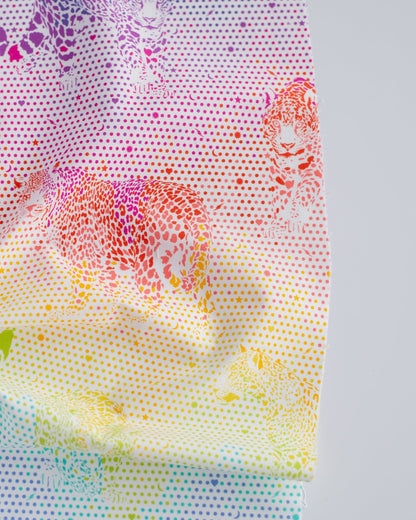 Cotton quilting fabric pattern called 'Mick Jaguar in Passion Fruit'. Part of the 'Daydreamer' fabric collection. Designed by Tula Pink for fabric company Free Spirit Fabrics. SKU: PWTP173.PASSIONFRUIT. 44-45 inch width.