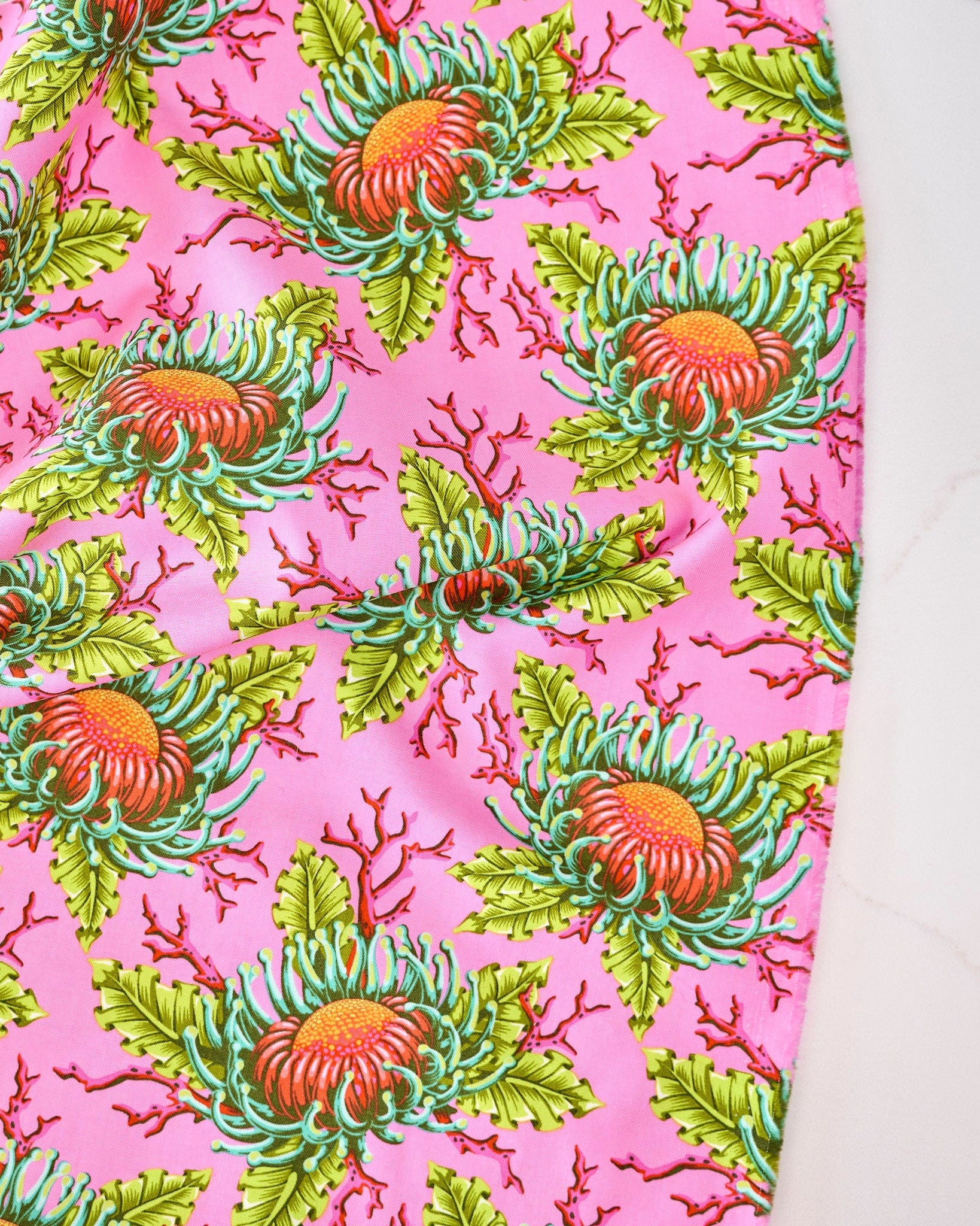 Friends & Anemones in Coralline quilting fabric, part of the Floral Reef fabric collection by Tula Pink (SKU: PWTP265.CORALLINE)