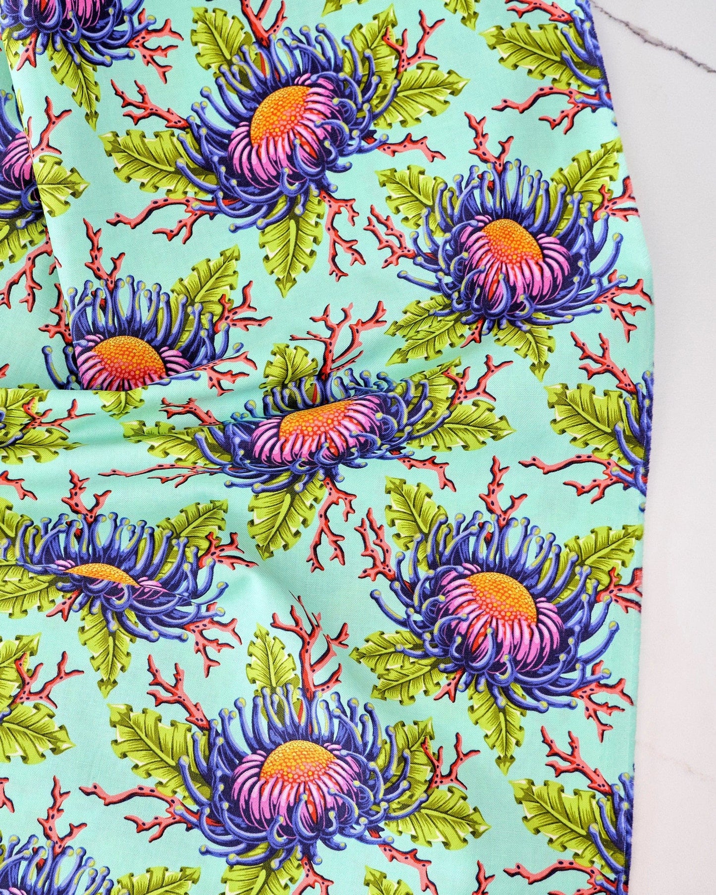 Friends & Anemones in Seafoam quilting fabric, part of the Floral Reef fabric collection by Tula Pink (SKU: PWTP265.SEAFOAM)