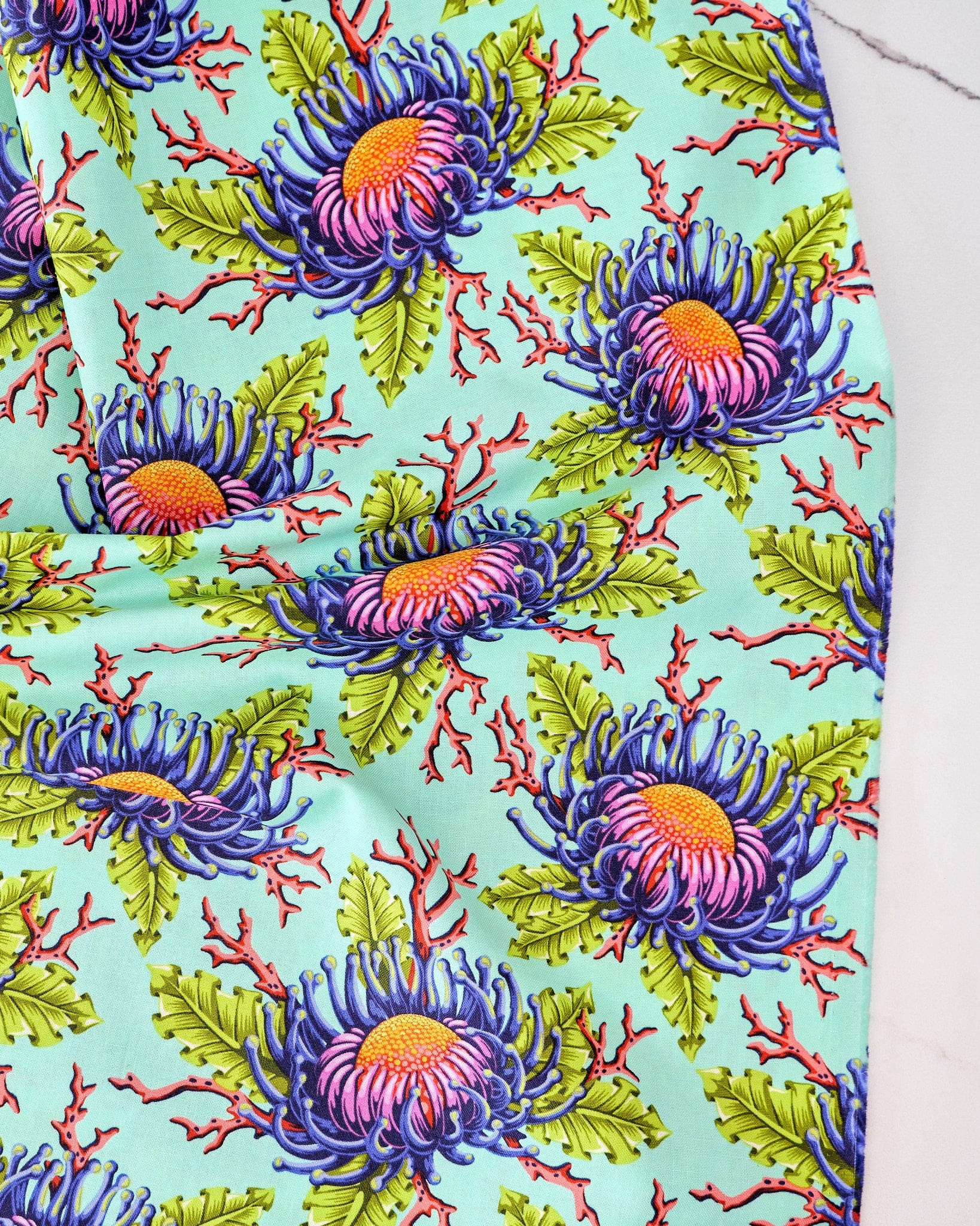 Friends & Anemones in Seafoam quilting fabric, part of the Floral Reef fabric collection by Tula Pink (SKU: PWTP265.SEAFOAM)