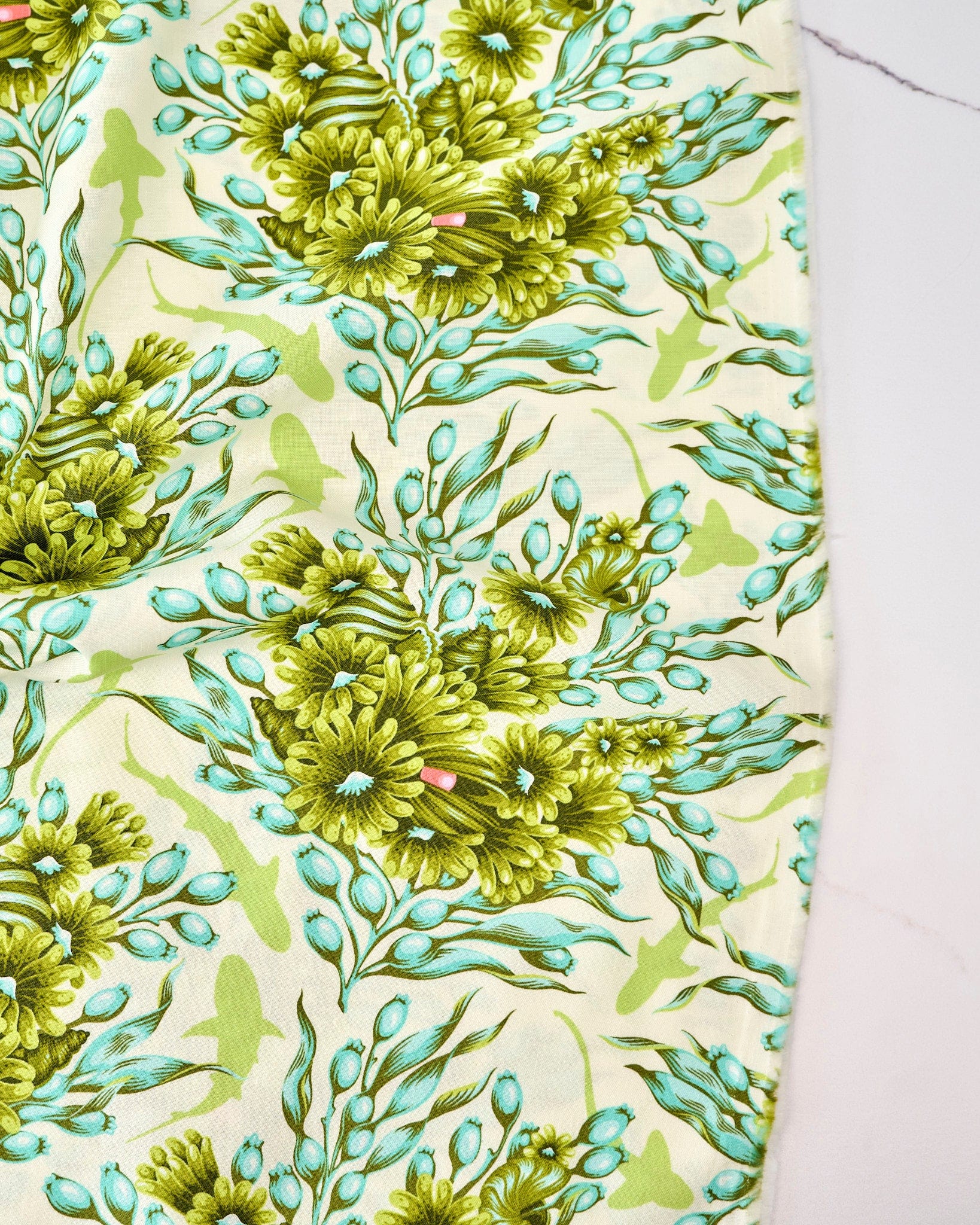 Shadow Sharks in Seagrass quilting fabric, part of the Floral Reef fabric collection by Tula Pink (SKU: PWTP267.SEAGRASS)