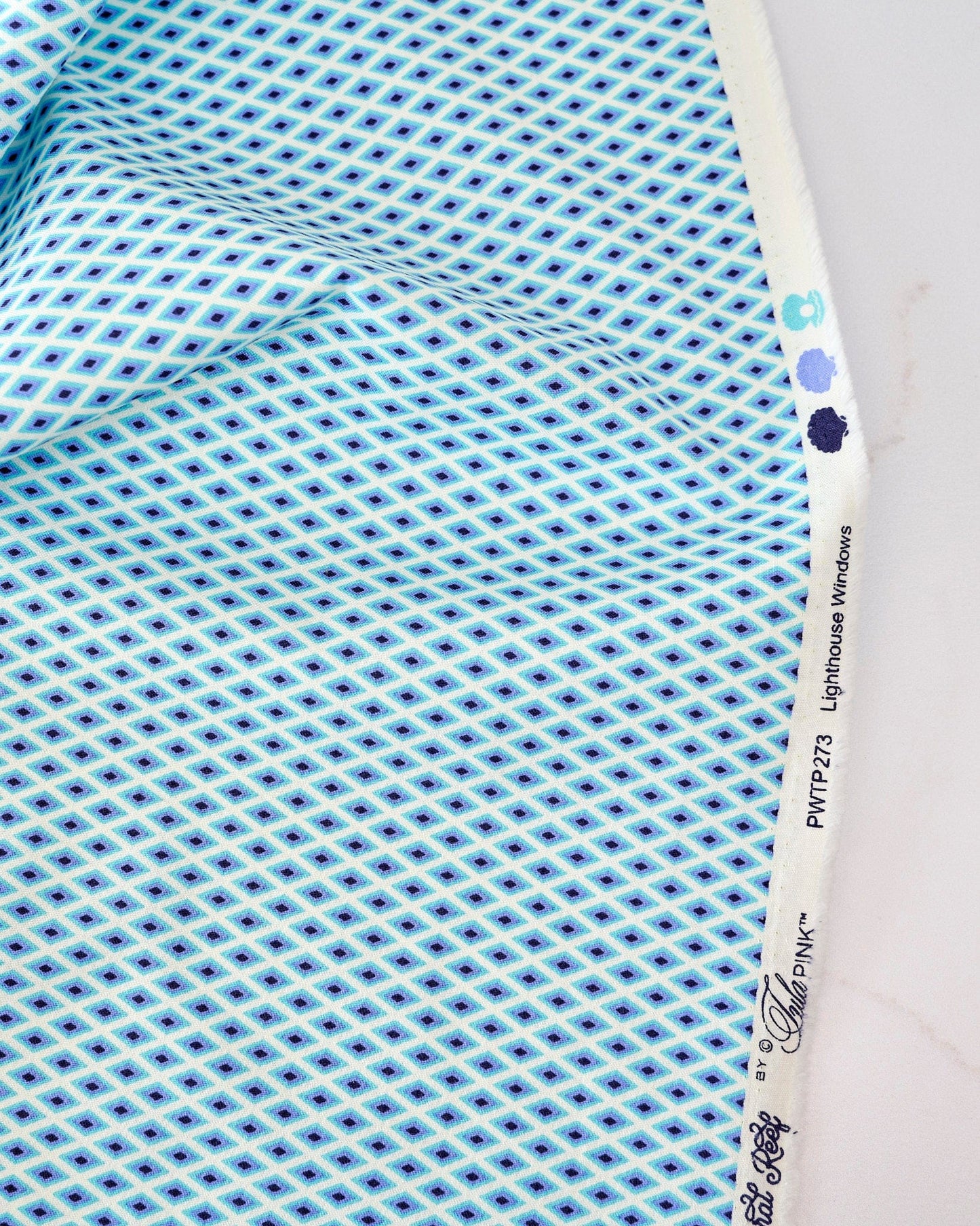 Lighthouse Windows in Marine quilting fabric, part of the Floral Reef fabric collection by Tula Pink (SKU: PWTP273.MARINE)