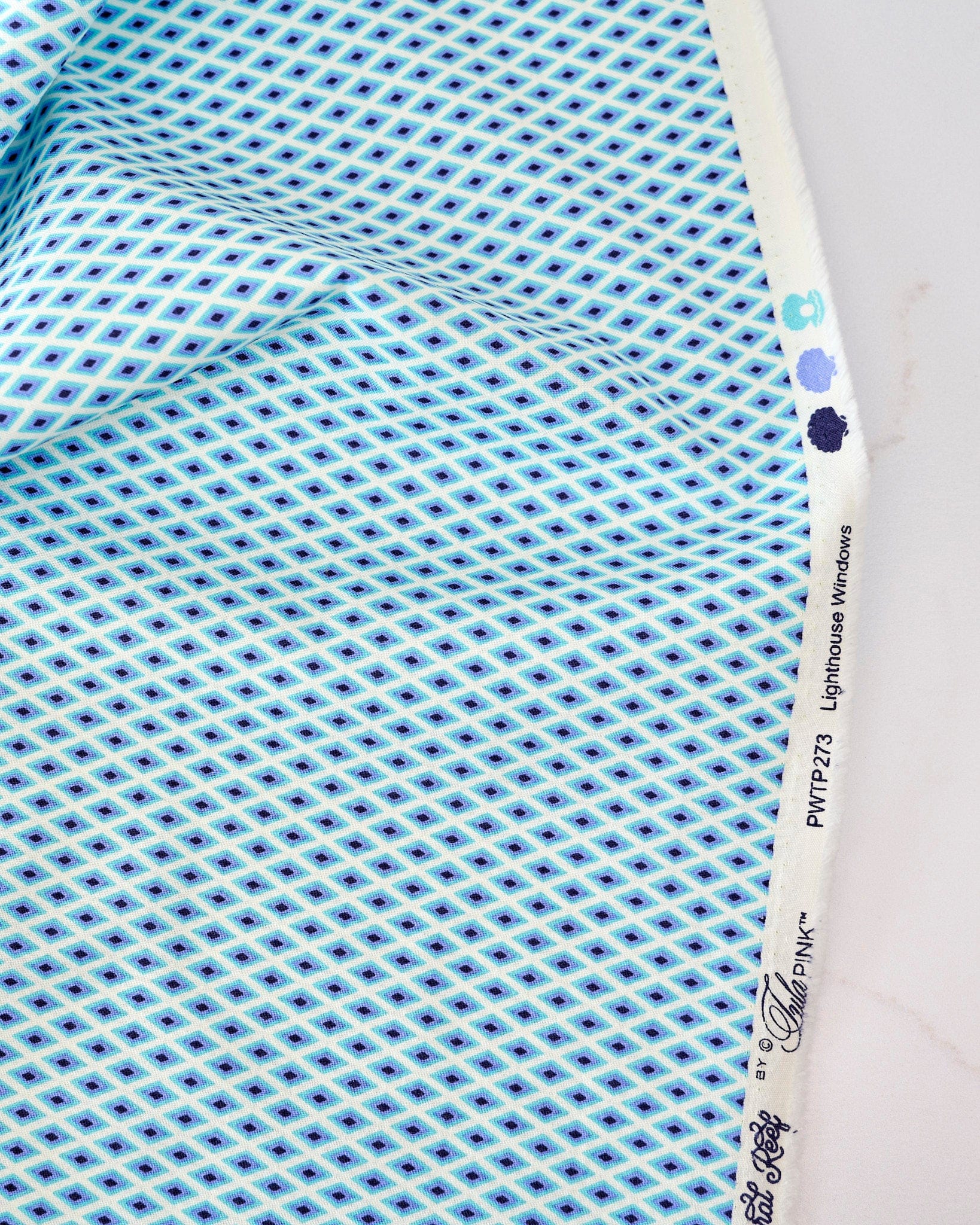 Lighthouse Windows in Marine quilting fabric, part of the Floral Reef fabric collection by Tula Pink (SKU: PWTP273.MARINE)